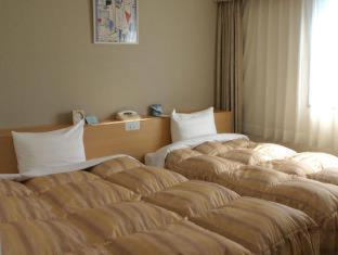 Okura Hotel Marugame Rum bild